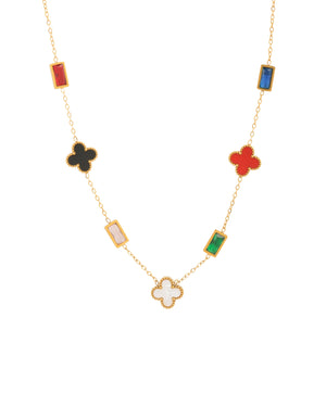Gold chain necklace with colorful rectangular and clover-shaped enamel charms in black, red, white, blue, green.