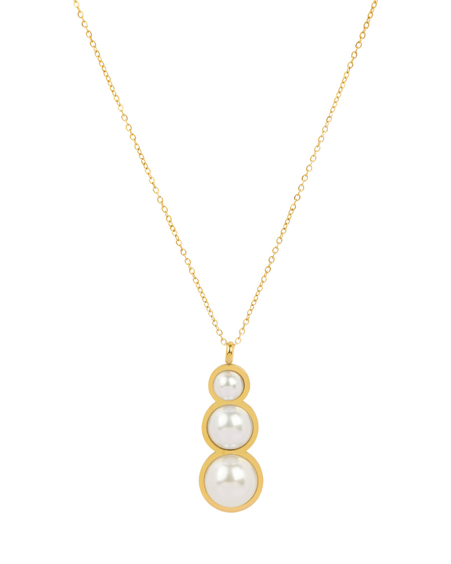 Gold chain necklace with a pendant featuring three graduated white pearls in a vertical gold setting