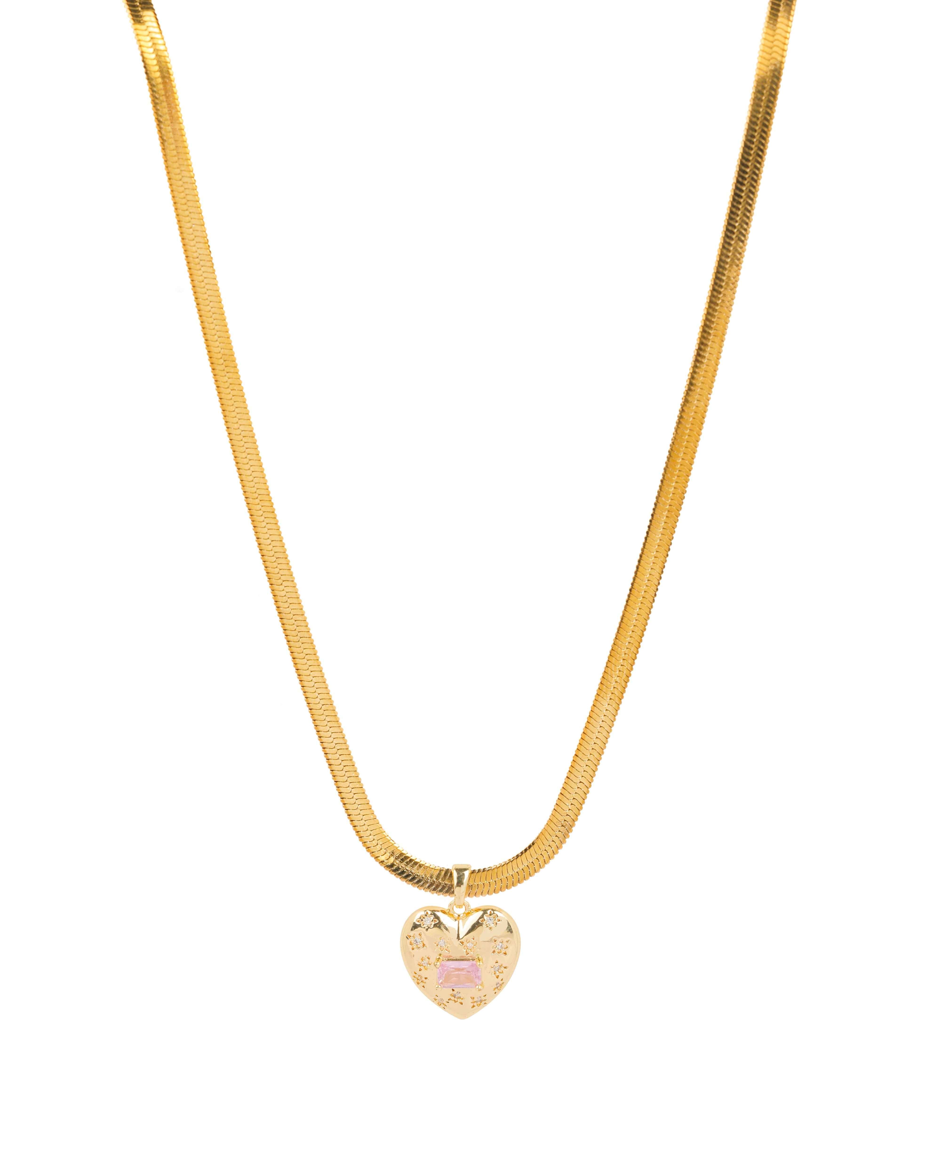 Gold chain necklace with heart-shaped pendant featuring a pink gemstone and small star engravings